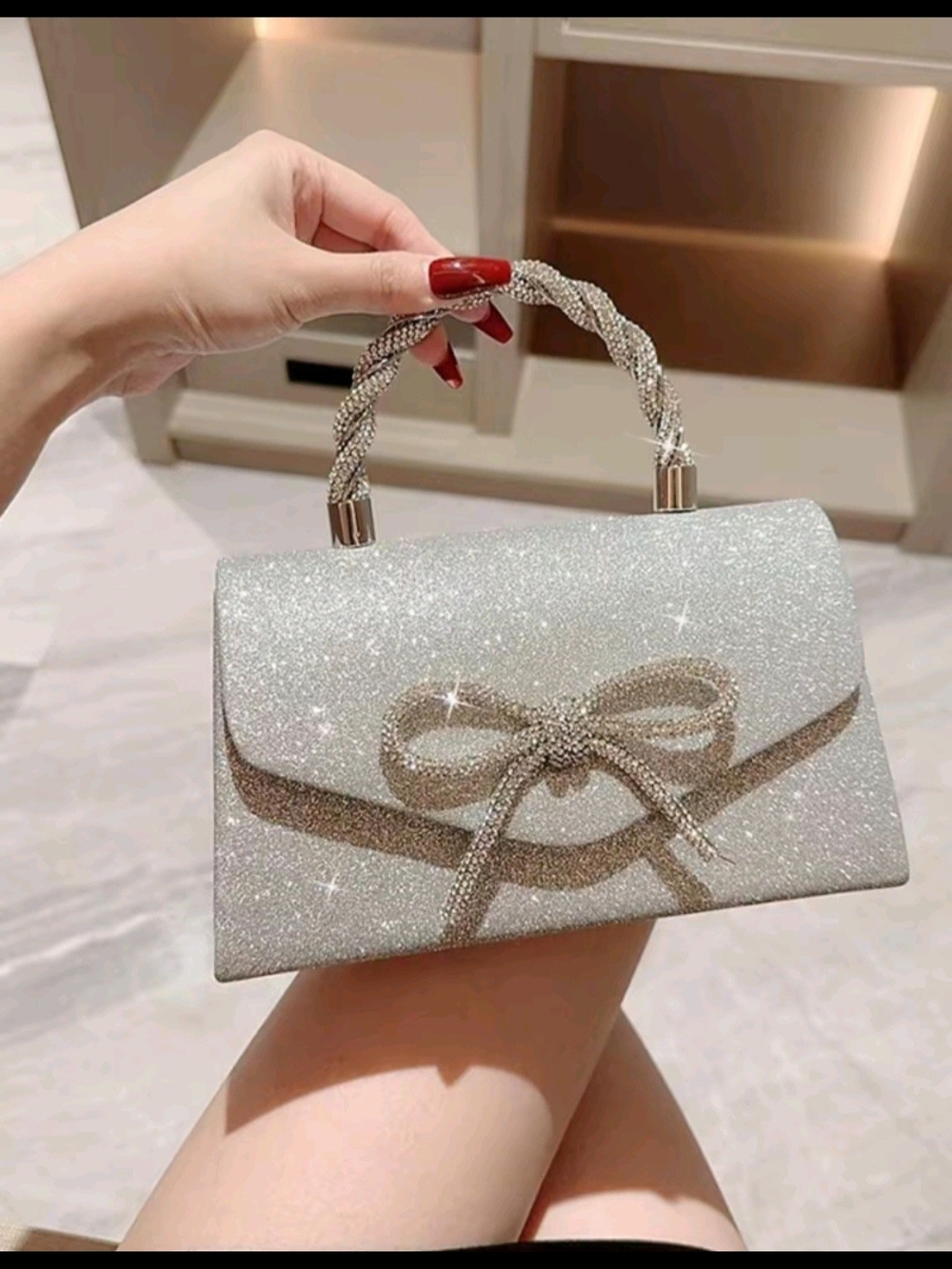 Sparkling Silver Bow Top-Handle Clutch